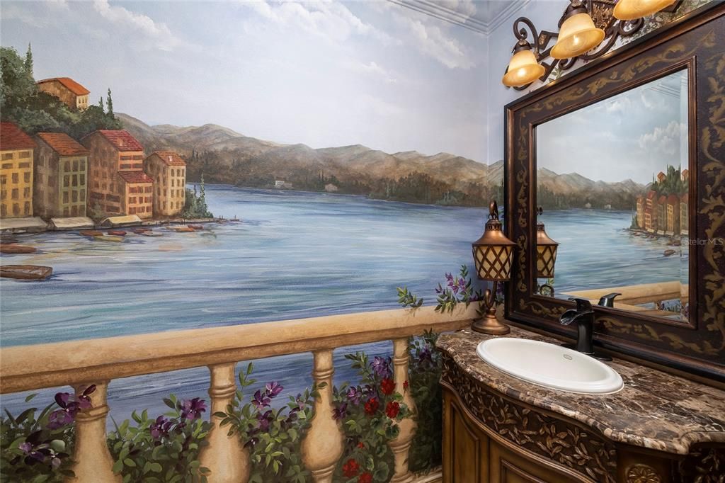 Powder bath with view reminiscent of looking over the balcony at the coast of Portofino, Italy.