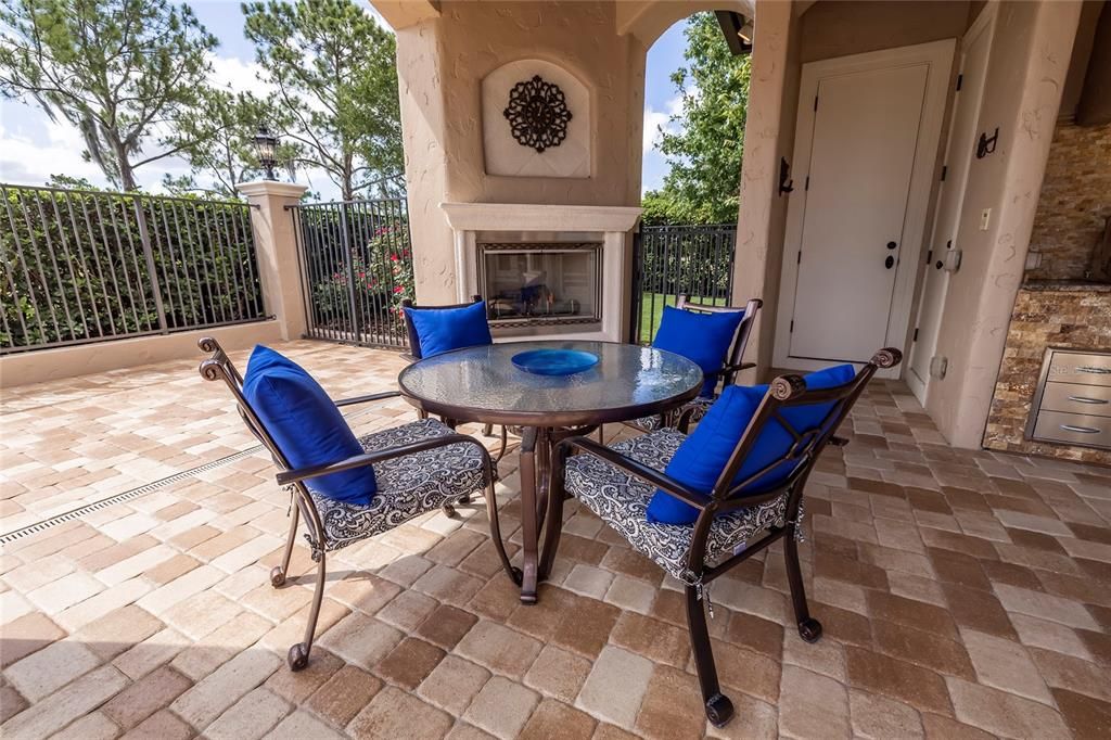 Outdoor gas fireplace for those cooler winter evenings. Also outdoor storage closet and air conditioned pool bath with access from the lanai.  Enjoy music through the home sound system.