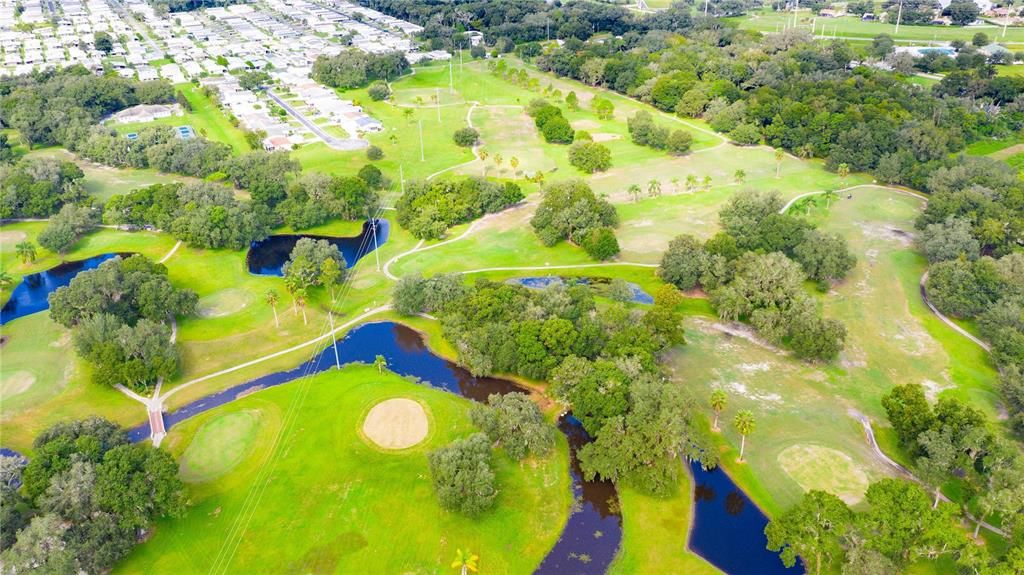 Community has three nine hole golf area.