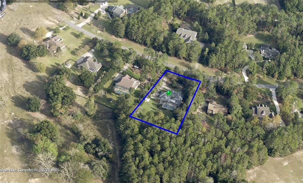 Satellite View illustrates the private setting. 16 wooded acres behind is HOA owned.