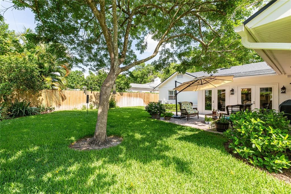 Meticulously maintained lush backyard has plenty of room to add a pool!