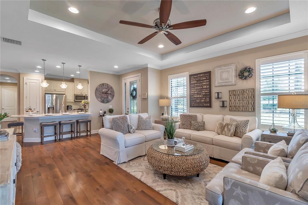 Open concept! Gorgeous flooring, upgraded lighting and ceiling fans.