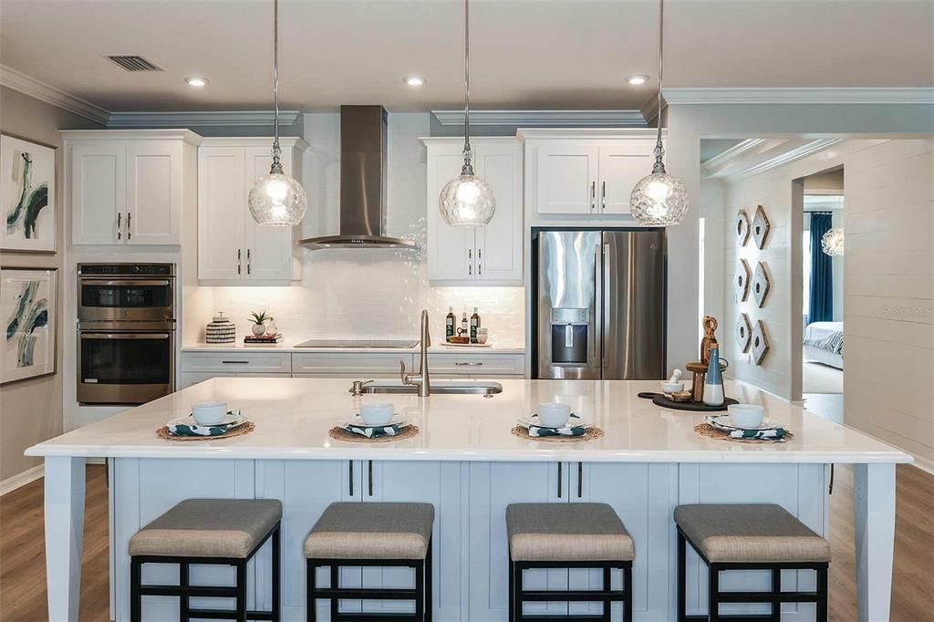 REPRESENTATIVE PHOTO. This huge kitchen island can serve a dual purpose in your home for food prep and additional dining space!