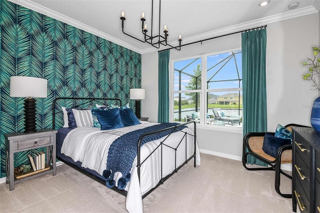 REPRESENTATIVE PHOTO. Lots of natural light with a beautiful color scheme in this secondary bedroom is the perfect place to relax.