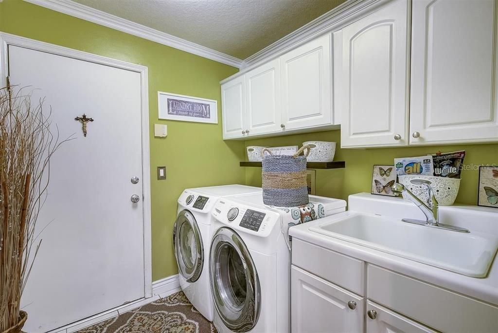 Great Cabinets and Sink in the Laundry Room