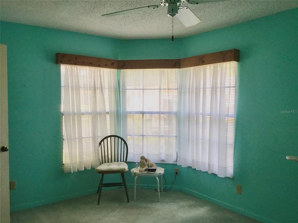 Bedroom #2 has a beautiful bay window.