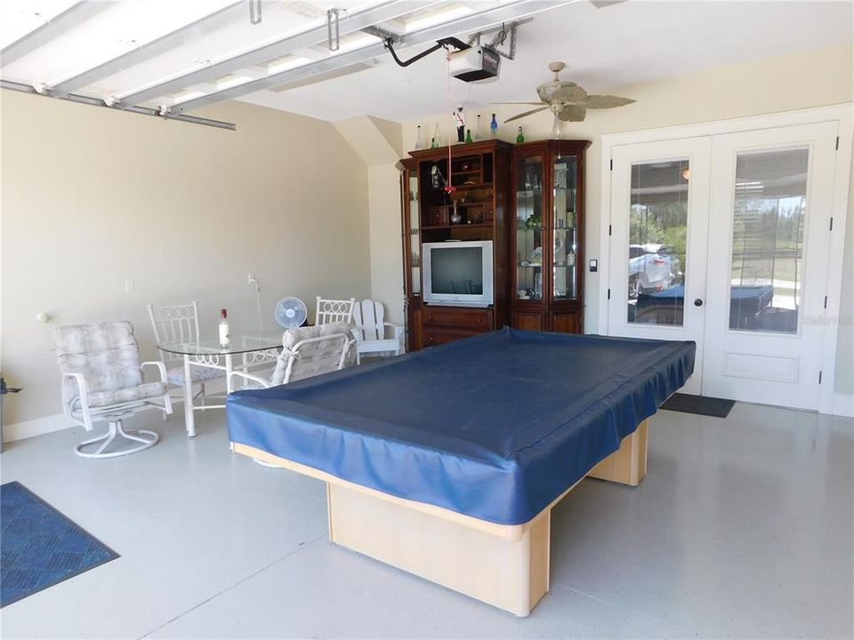 Double garage; currently shown as a game/recreational gathering area.