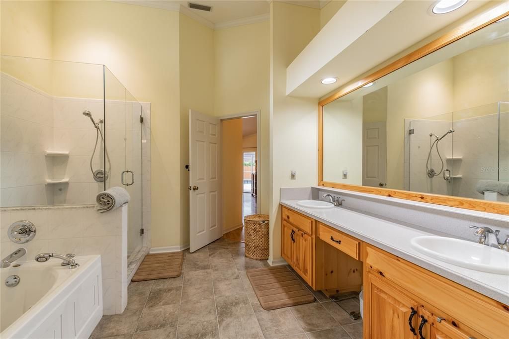 Master ensuite offers it all! Glass shower enclosure, dual sinks, soaker tub.