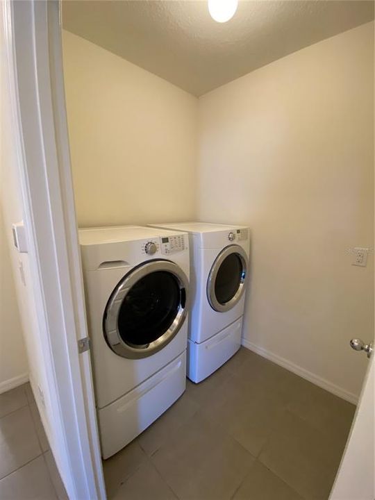Laundry Room complete with Washer and Dryer