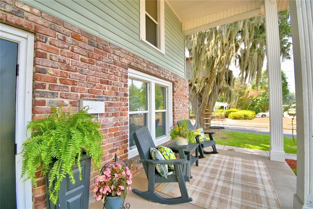 ENJOY LAKEFRONT SUNSETS FROM THE FRONT PORCH ROCKING CHAIRS.