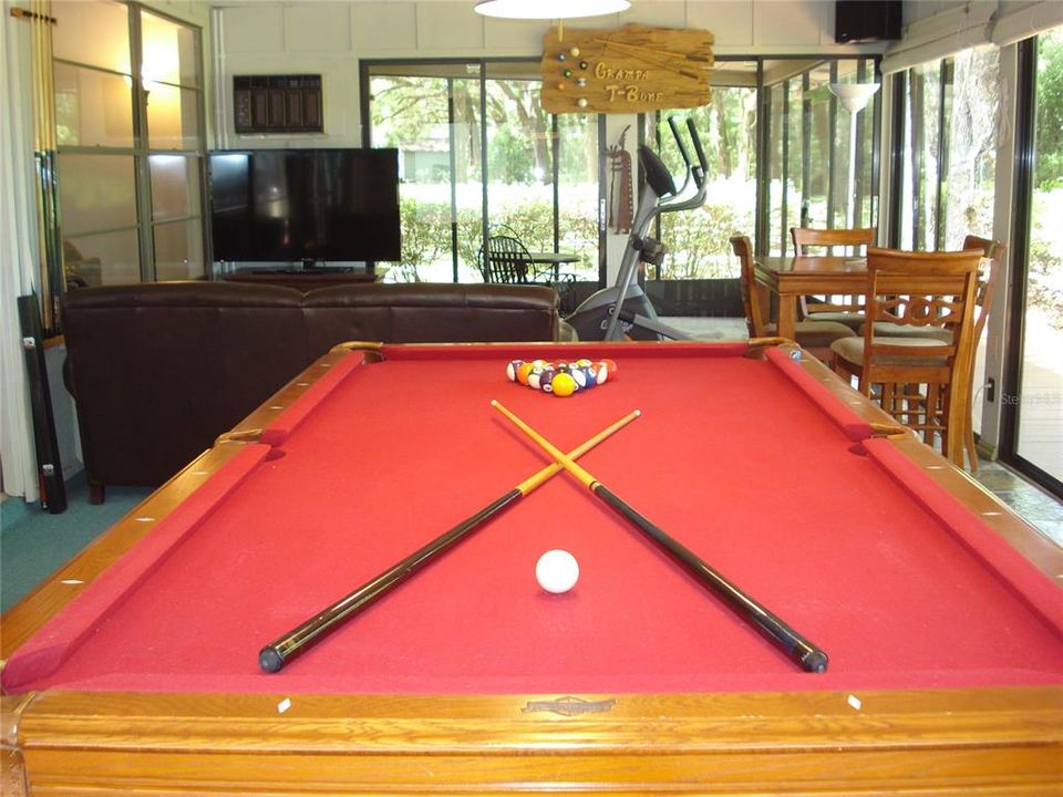 The pool table is included!