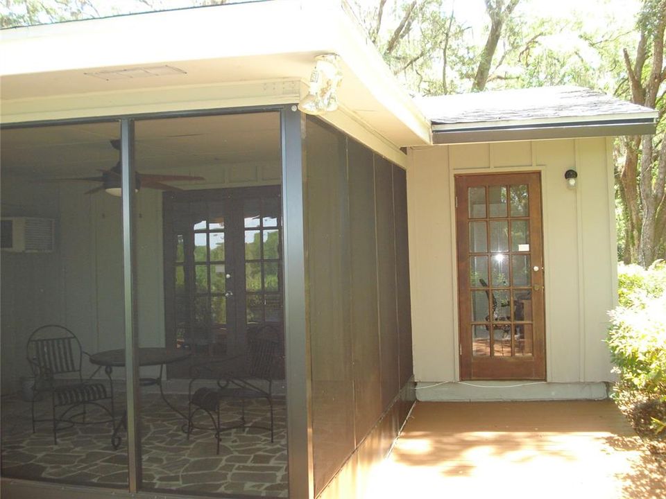 Rear view of private entrance and porch for rear bedroom.  Perfect for guests!