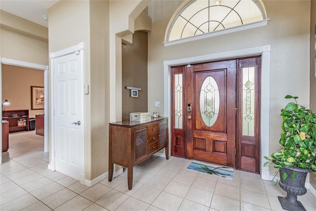 Entry area; white door leads to stairs to 1st floor garages & apartment.