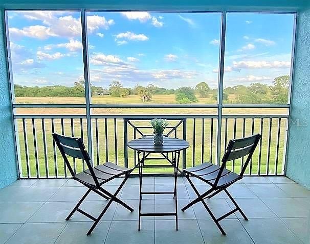 Sit back and relax on your private screened lanai.