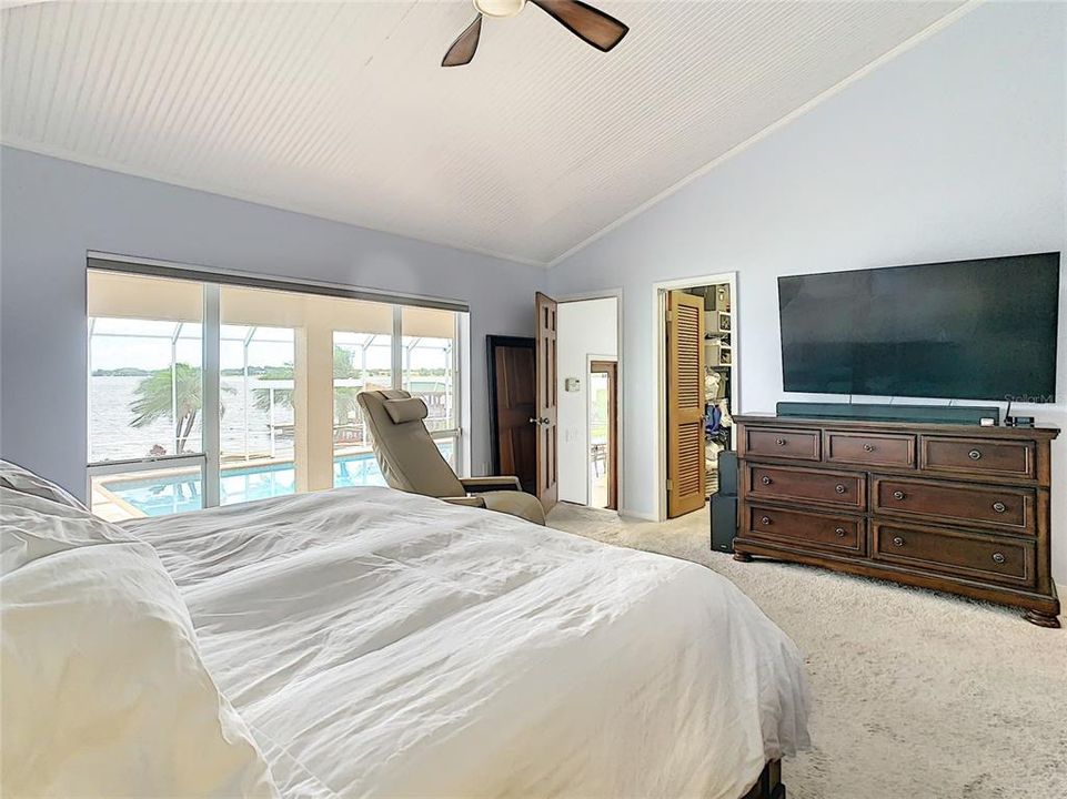 Master Bedroom with View of Pool and Lake