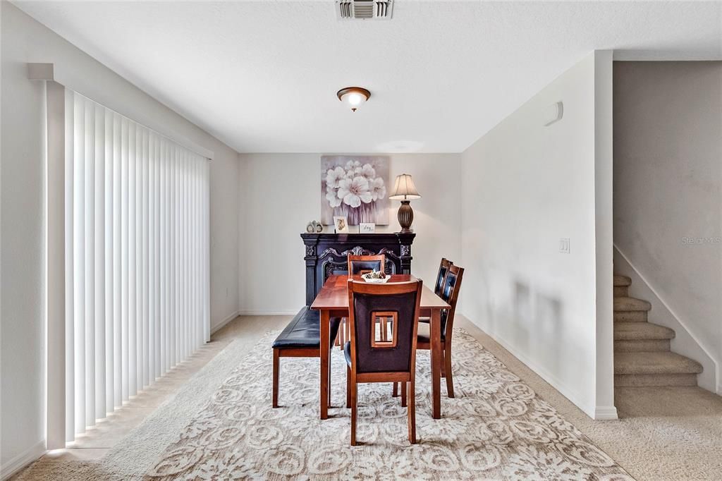 Dining room with sliders to the back yard