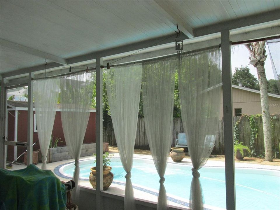 Large screened lanai overlooks pool
