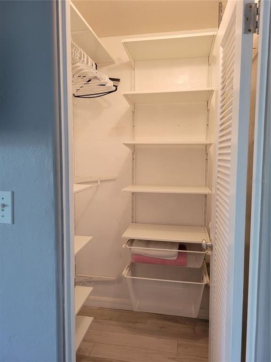 Bedroom walk-in closet.