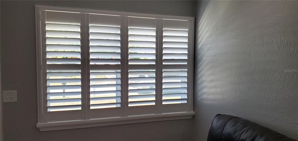 All  top quality shutters installed throughout the home.  This is the front window from livingroom