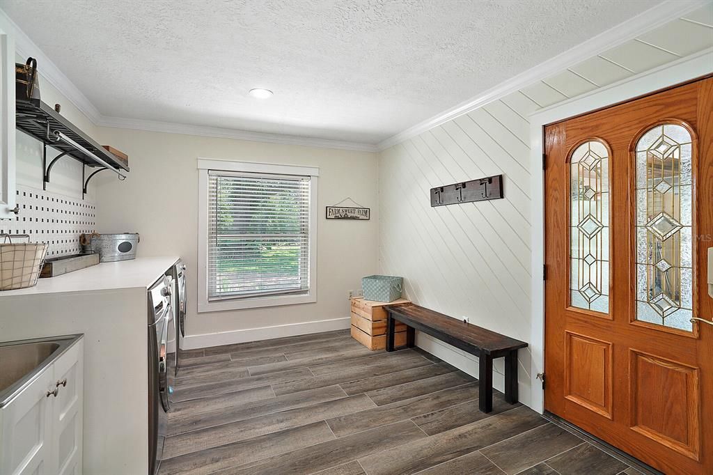 Entrance from garage into the laundry/mudroom