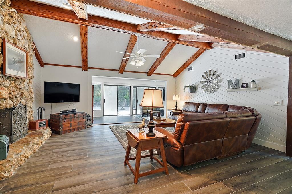 Vaulted Great room with stone fireplace