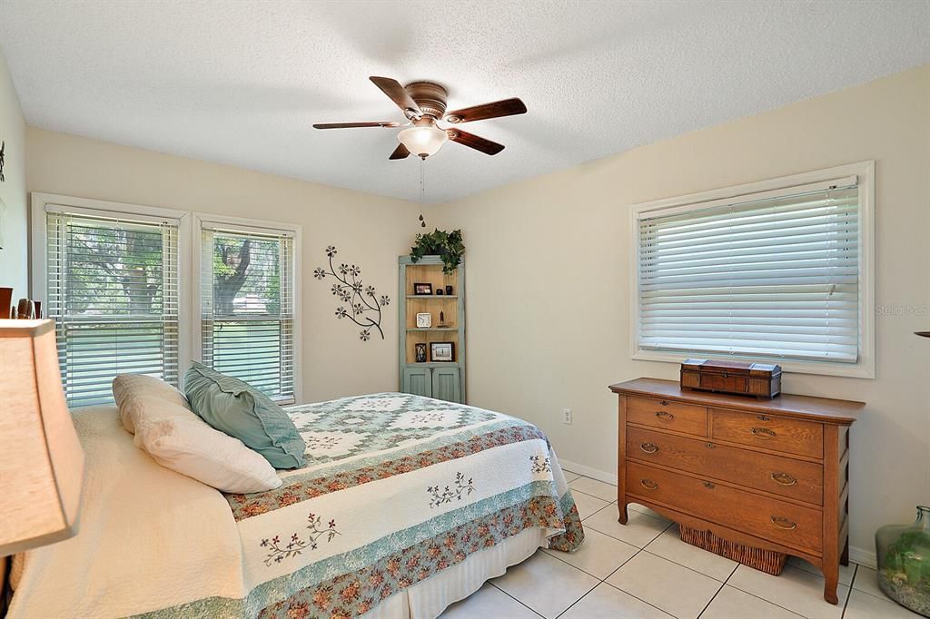 Second bedroom with large windows