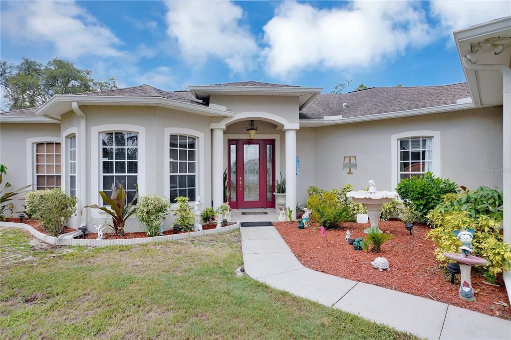 Welcome Home.  Front door faces East.  Leaded Glass door to let that morning light shine in.