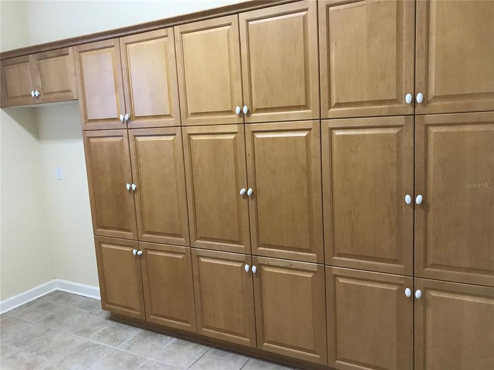 Other side of Laundry room ....tons of storage & a Pantry