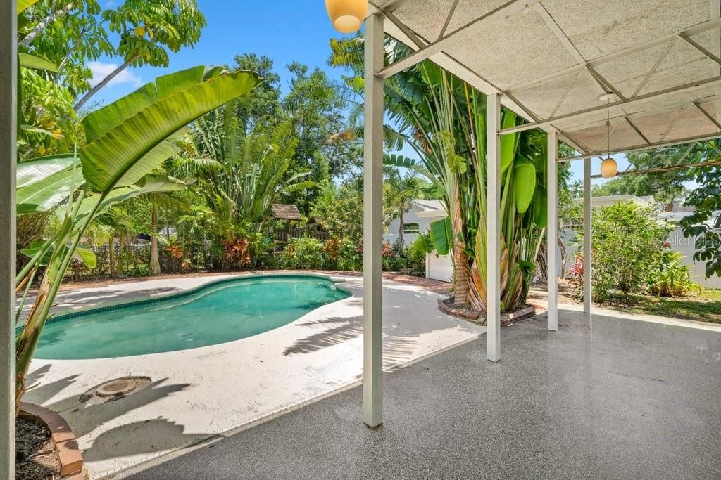 Tropical and lush landscape offer privacy around your resort style pool.