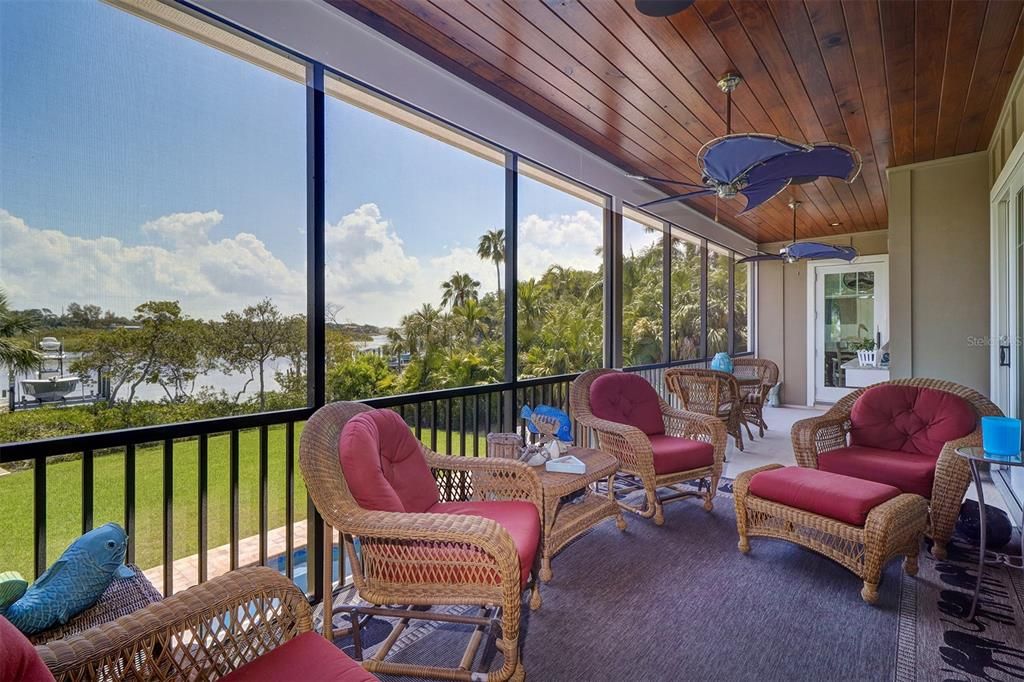 Rear deck / balcony with views to the pool and river.