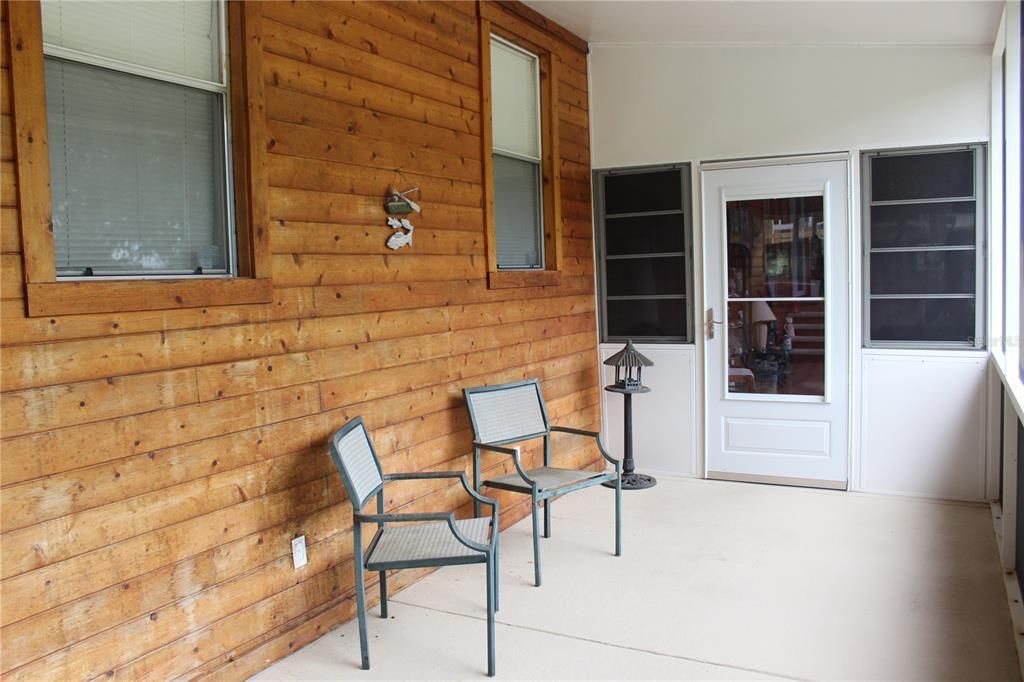 Screen Enclosed Entry Porch with Cedar Wall