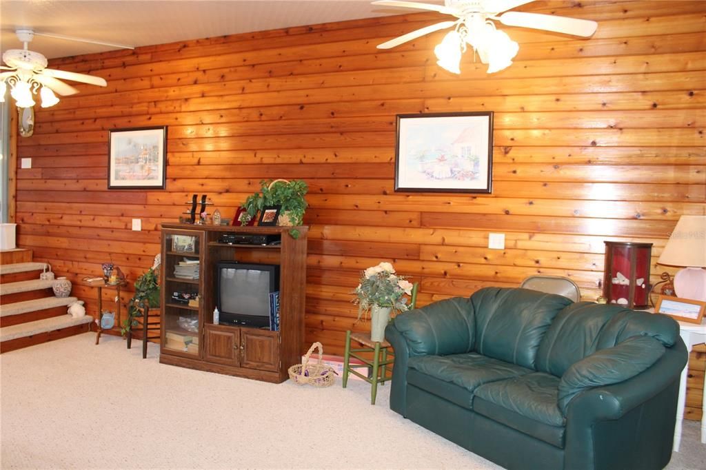 Beautiful Cedar Wood Wall Runs the length of the home along the front