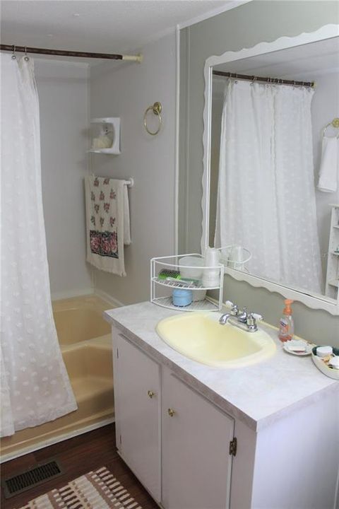 Master Bath has large garden tub with shower