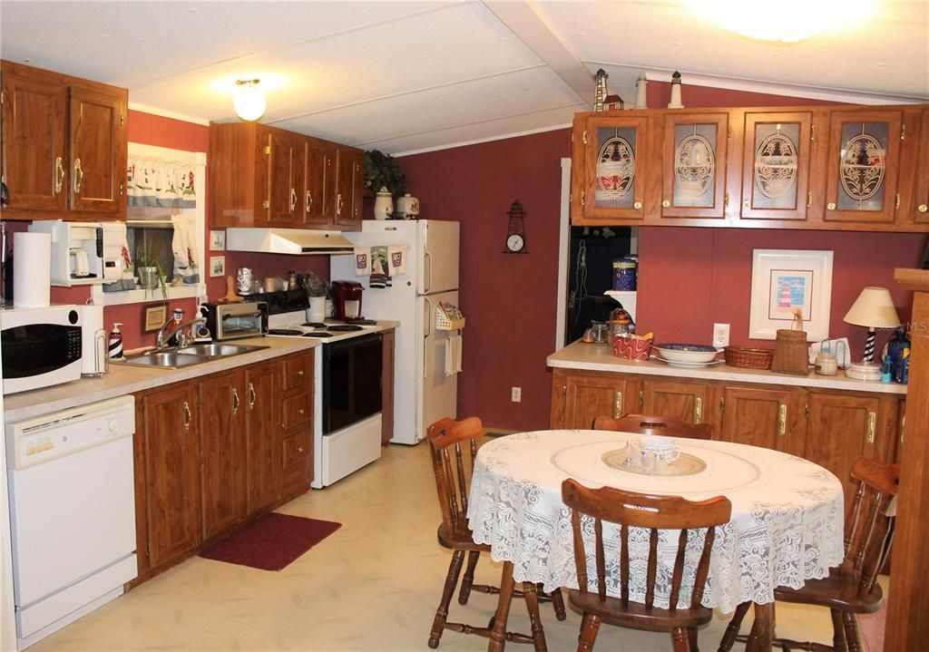 Perfectly laid out kitchen with laundry tucked away on the other side of the penensula