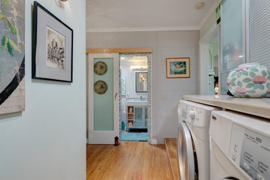 Looking in towards Bath #3. Shower Bath. Rain Glass Barn Door.