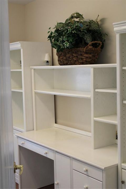 Laundry room converted to an office/extra storage space