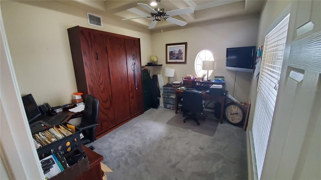 Bedroom 4 utilized as office with pull down murphy bed