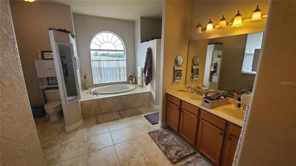 Spacious Master bathroom with oversized tub and double walk in shower