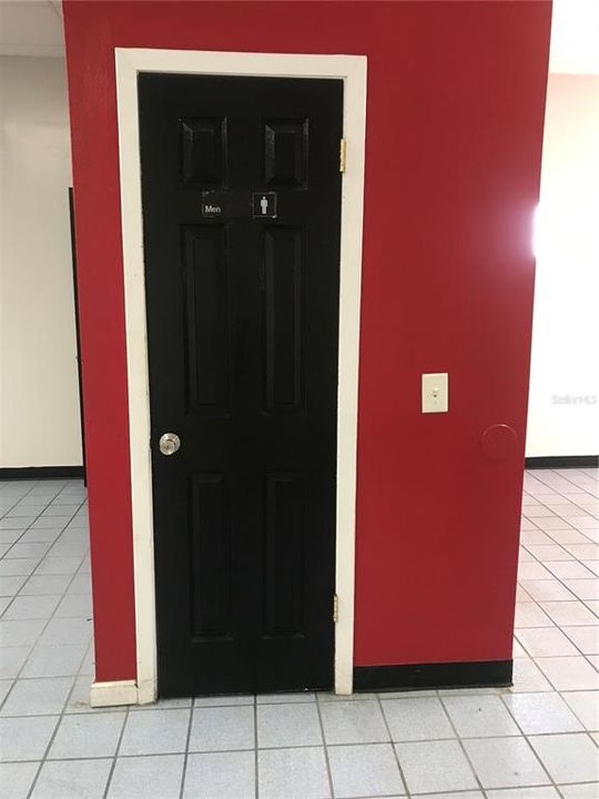 door to bathroom.  Both bathrooms are between the reception and showroom areas