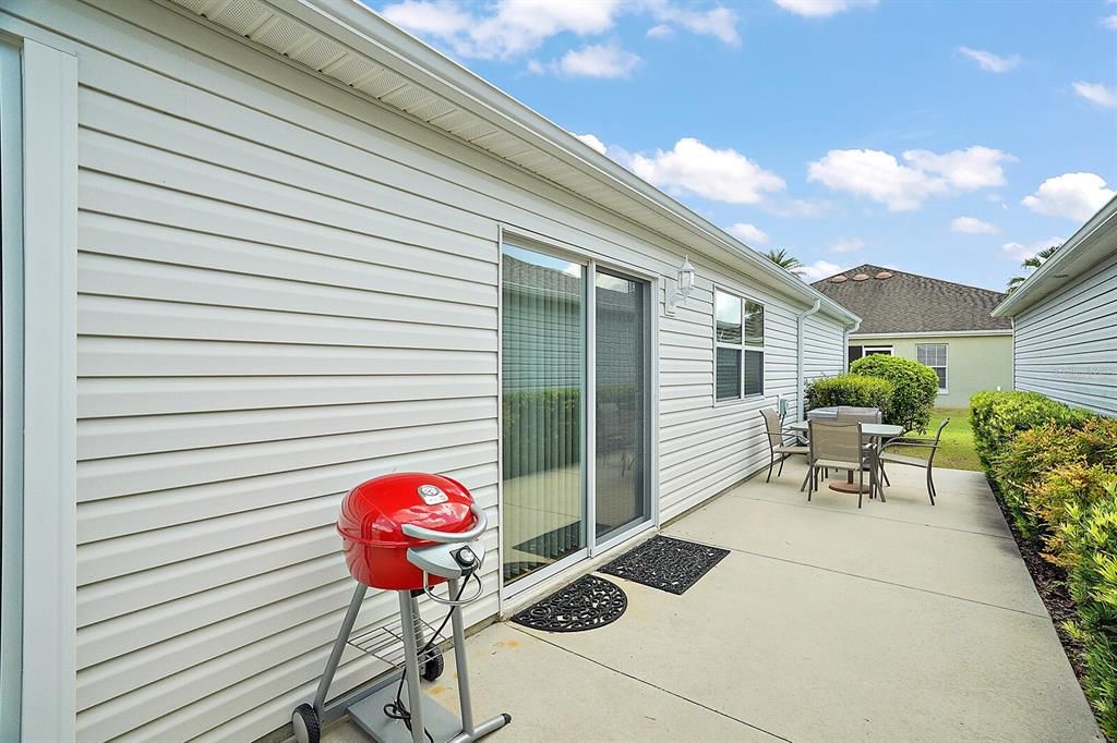 Side patio with room to grill