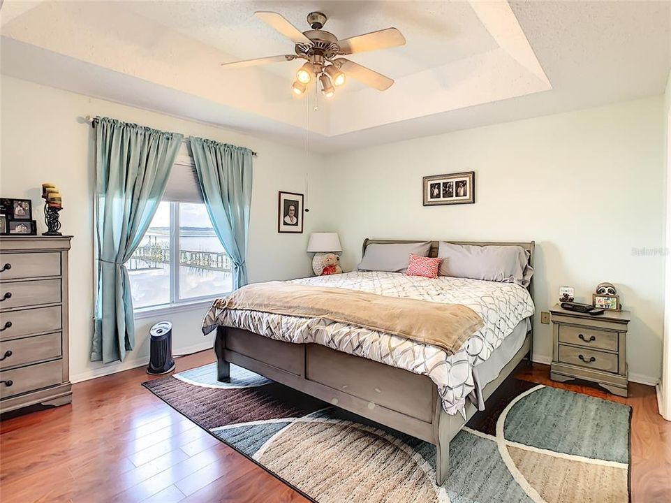 GORGEOUS FLOORING AND A BEAUTIFUL TRAY CEILING IN THE MASTER BEDROOM!