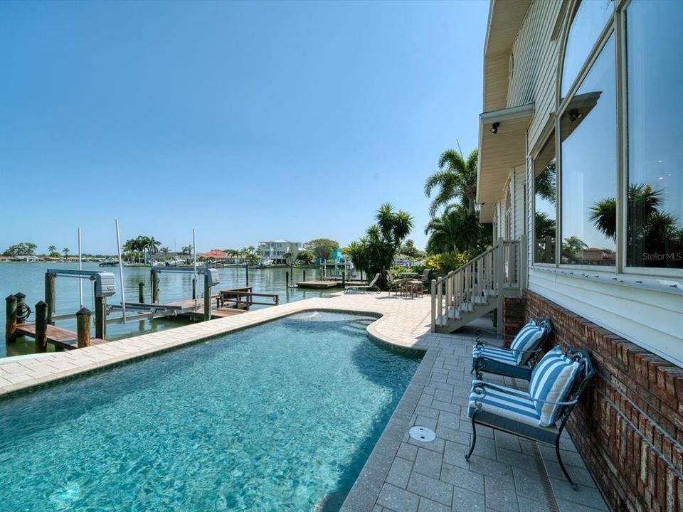 Enjoy a dip in the salt water pool, or a cruise in the intracoastal-imagine: your boat moored at your back door.
