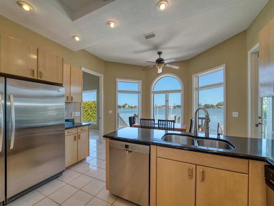 Beautiful views from the fully equipped kitchen with granite counters, extensive cabinetry.