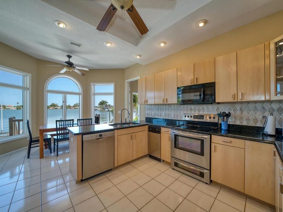 Large kitchen with eat in breakfast nook.