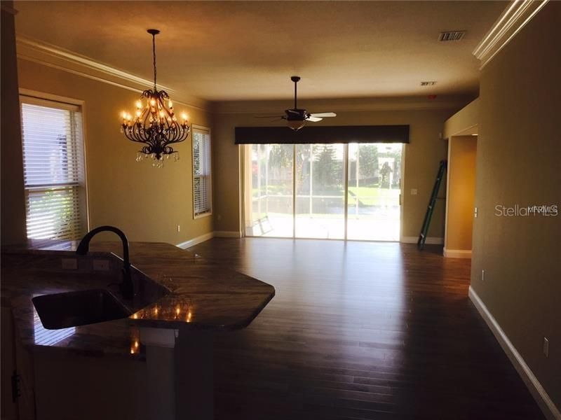 Living Room with view of Lanai and pond.