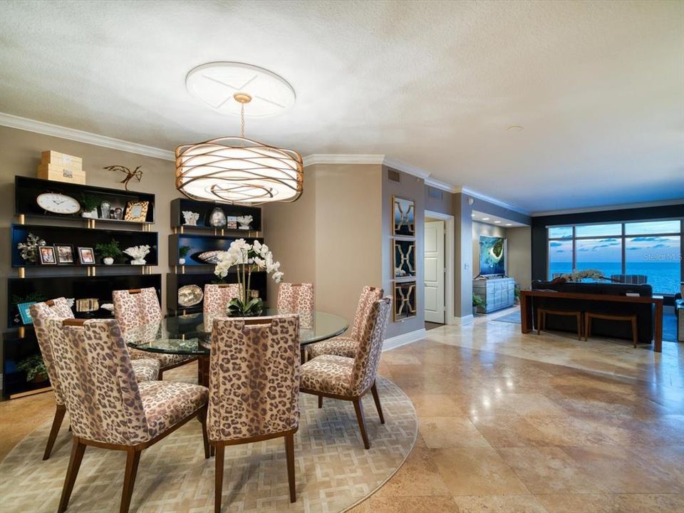 The open floor plan is perfect for entertaining while enjoying the breathtaking Gulf of Mexico views.