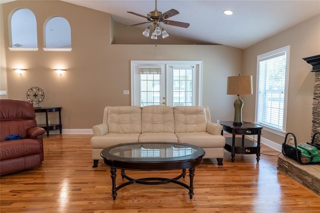 French doors off the great room lead to oversized covered lanai