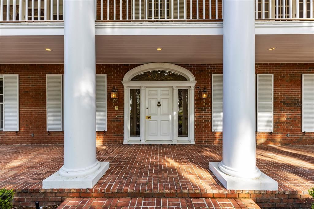 Stately columns flank the front entrance.