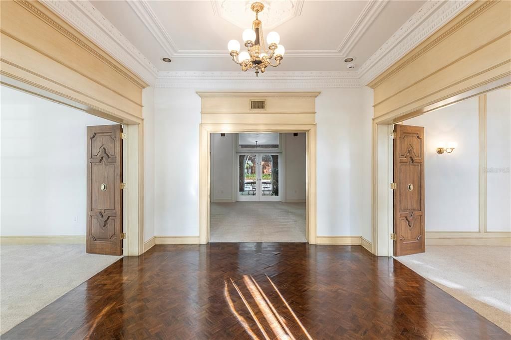 Elegant foyer sets the stage for all who enter through the door.