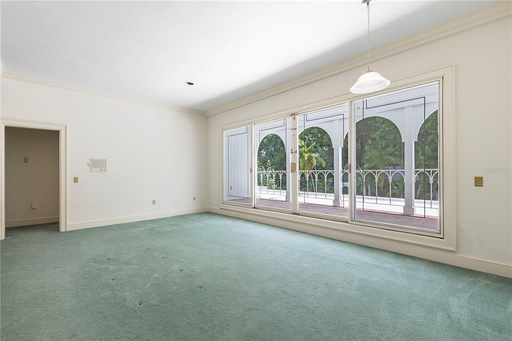 Upstairs are the secondary bedrooms and this large game / play room overlooking the rear balcony and backyard.